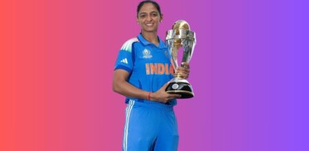 Harmanpreet Kaur holding the 2025 Women's Cricket World Cup trophy after leading India to its first title.